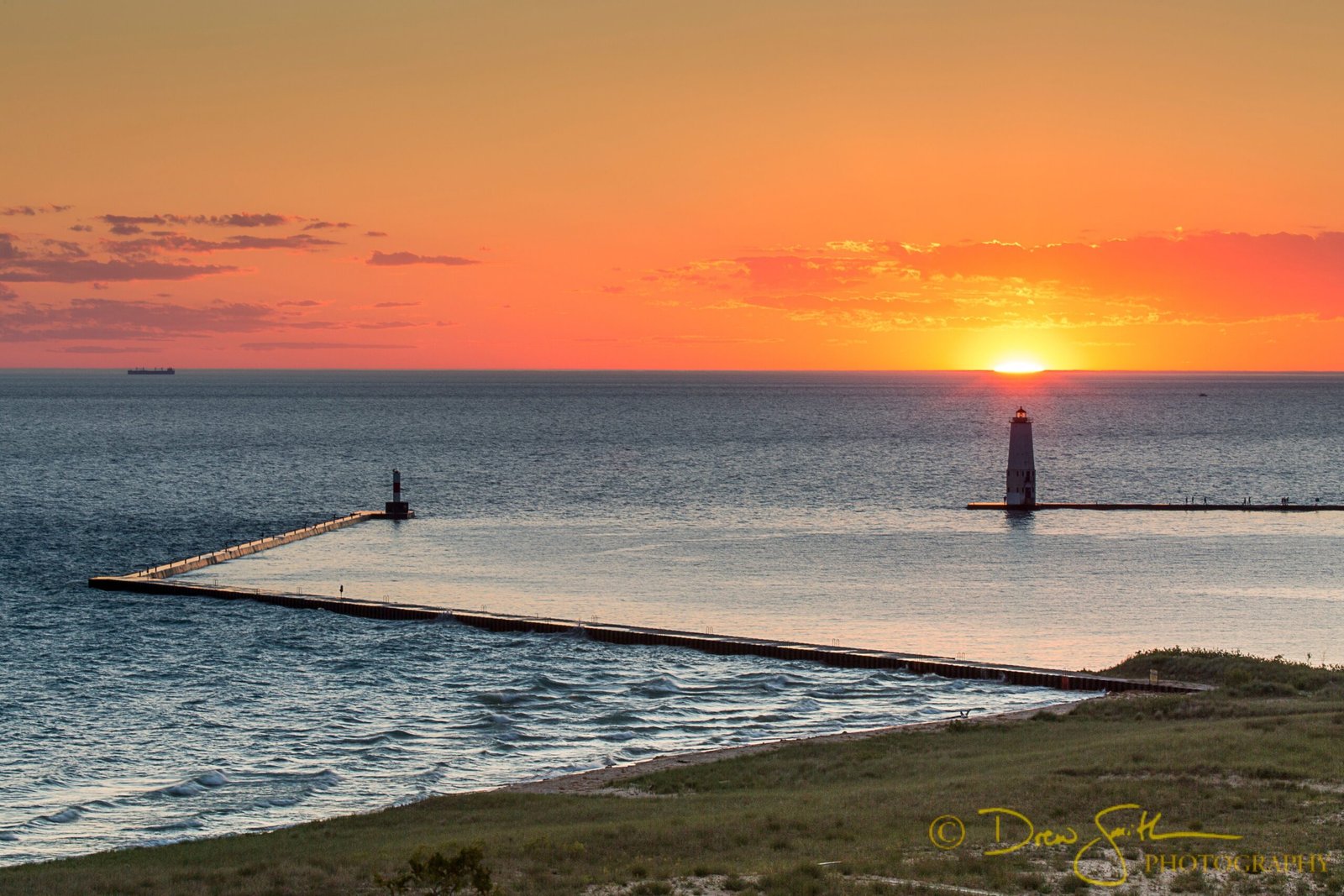 Sunset over the Frankfort piers on Lake Michigan